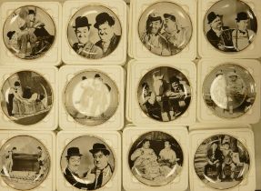12 Danbury Mint Laurel & Hardy Collectors Plates, in original poly liners with certificates(12)