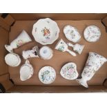 A collection of Coalport ceramic items to include vases, pin dishes, bells, cream jug and sugar bowl