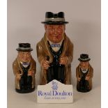 Set of three Sir Winston Churchill graduated Royal Doulton toby jugs together with a ceramic display