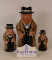 Set of three Sir Winston Churchill graduated Royal Doulton toby jugs together with a ceramic display