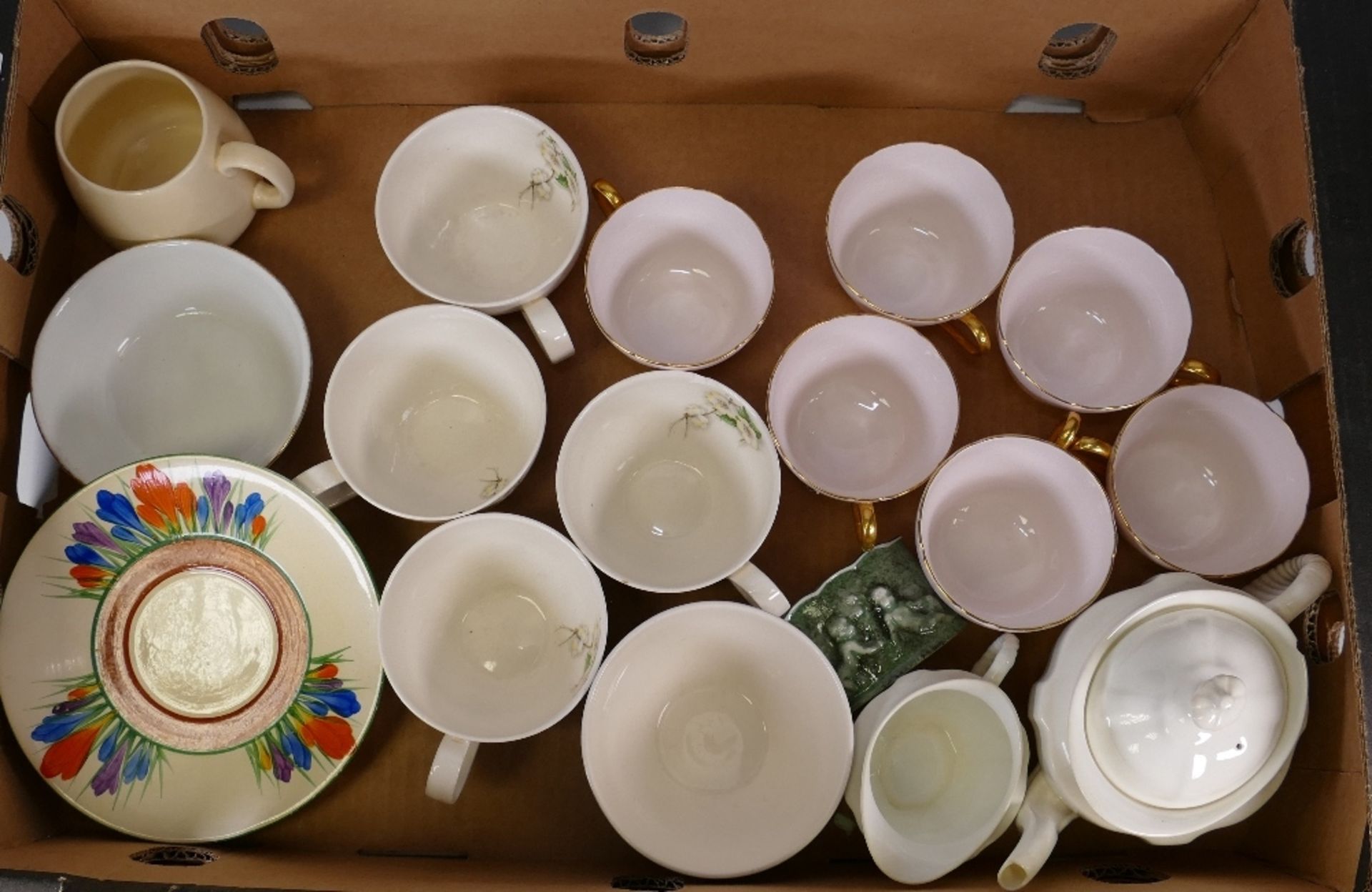 A mixed collection of items to include Clarice Cliff cups, Royal Crown Derby saucers, milk jug,