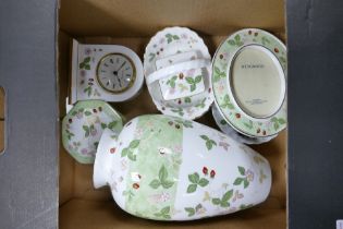 A collection of Wedgwood Wild Strawberry items to include basket, lidded trinket dishes, basket,