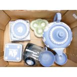 A collection of Wedgwood Jasperware items to include blue teapot, cup, salt celler, trinket