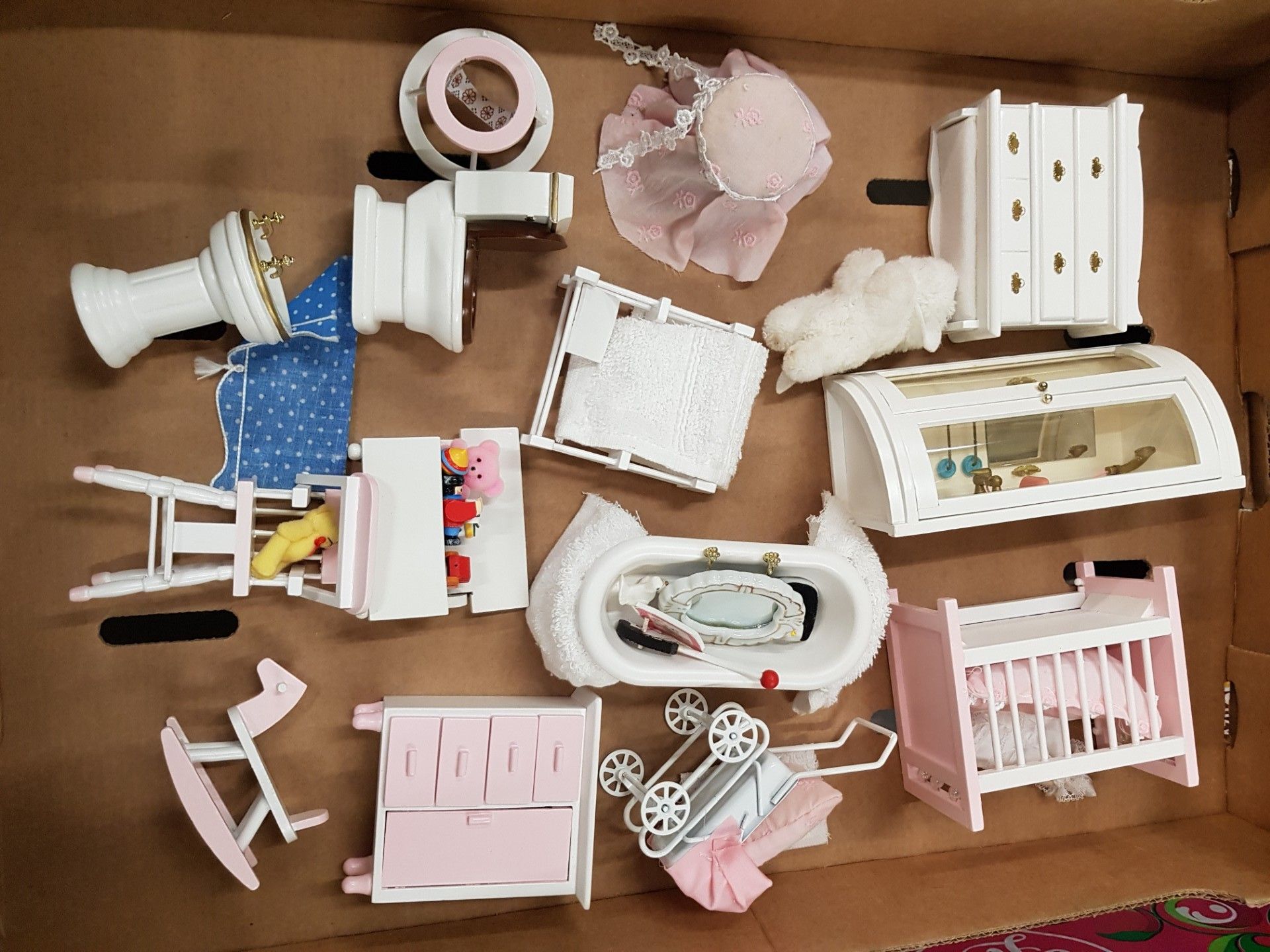 A good collection of dolls house furniture and accessories, bathroom and nursery theme (1 tray).
