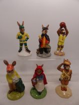 A collection of 6 Royal Doulton Bunnykins figures to include Basketball DB262, Town Crier DB259, Ice