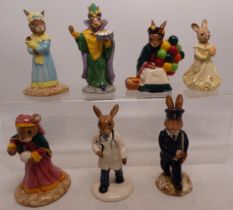 A collection of 7 Royal Doulton Bunnykins figures to include Old Balloon seller DB217, Mystic DB197,