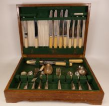 Incomplete cutlery set in wooden case