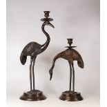 A Pair of Bronze Indian Candlesticks in the form of two Wading Herons. Height of tallest: 47cm(2)