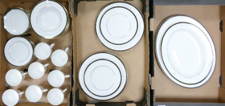 A Collection of Minton Saturn Pattern Dinnerware to include Platters, Dinner Plates, Tea Trios, etc.