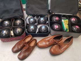 Three bowling bags and contents to include Thomas Taylor bowls, Taylor Elite bowls, bowling shoes