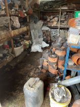 The contents of the Outdoor Shed to include brick ties, tiles, drainage fittings, etc.