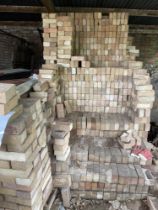 Large collection of new bricks in Outdoor shed