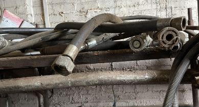 Various hydraulic hoses, pipes etc. 1 JCB tyre and 1 fork lift tyre