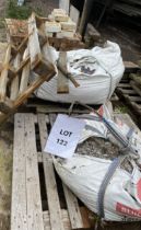 Half pallet of used bricks, part bag of shale and part bag of limestone