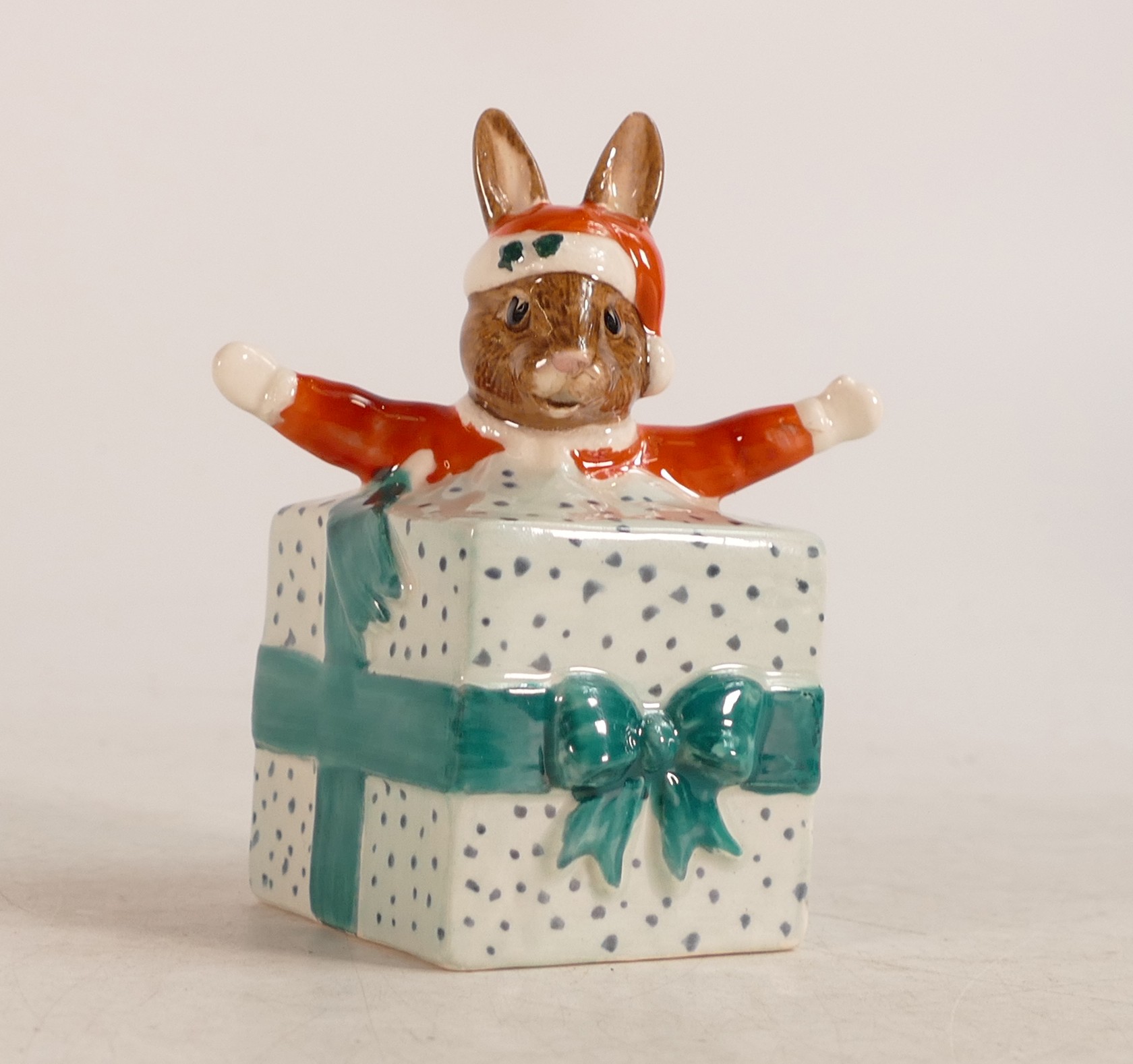 Royal Doulton Bunnykins figure Christmas Surprise DB149, painted in a different colour with not