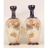 A pair of Carlton Ware Anemone vases. Height 321cm ( damage to top rim on 1)