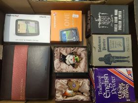 A mixed collection of items to include 2 TomTom Sat Navs, 3x English Pewters (boxed) & RJR John
