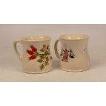 Two Moorcroft mugs in the Rosehip and Beauford patterns (2)