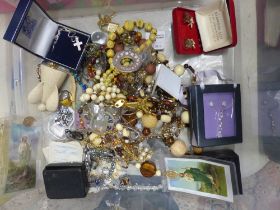 A collection of vintage and more modern costume jewellery to include necklaces, rings, cuff links