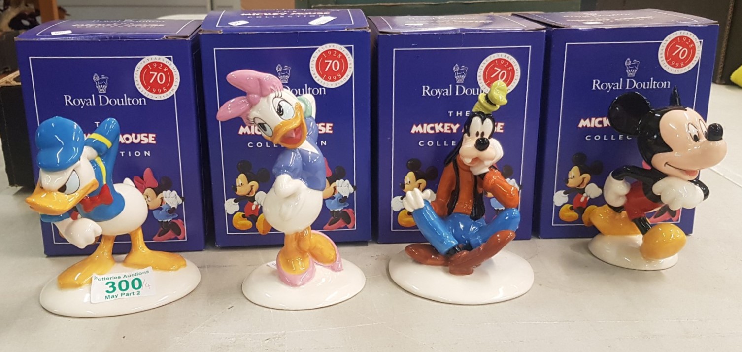 Royal Doulton Mickey Mouse figures to include Donald Duck MM3, Goofy MM5, Mickey Mouse MM1 and Daisy
