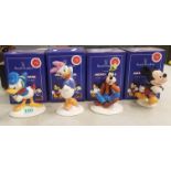 Royal Doulton Mickey Mouse figures to include Donald Duck MM3, Goofy MM5, Mickey Mouse MM1 and Daisy
