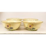 Four Carlonware Sunflower bowls, all state 01 trial to base, diameter 17cm (4)