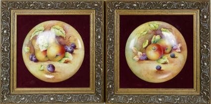 Two signed circular hand painted fruit plaques by L. Woodhouse