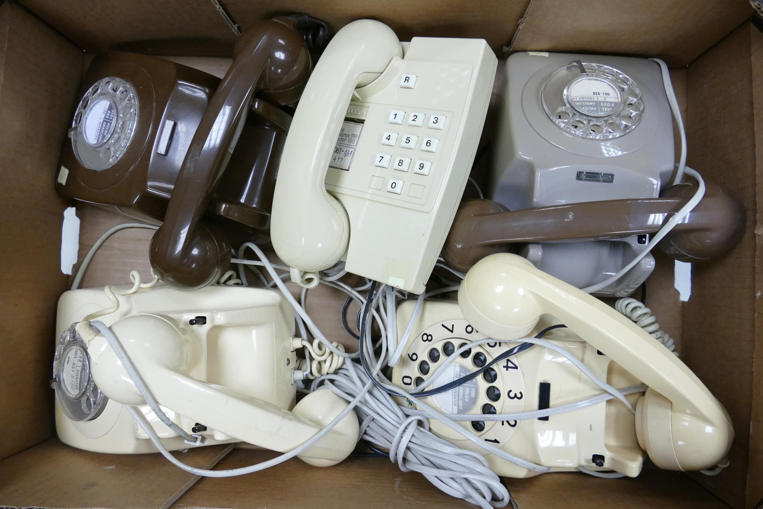A collection of vintage telephones in colours brown, green/brown and cream (5)(1 tray)
