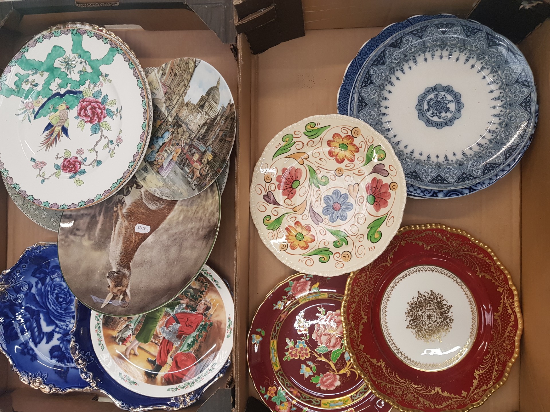 A mixed collection of decorative wall plates to include Doulton Burlem, Crown Staffordshire, Royal