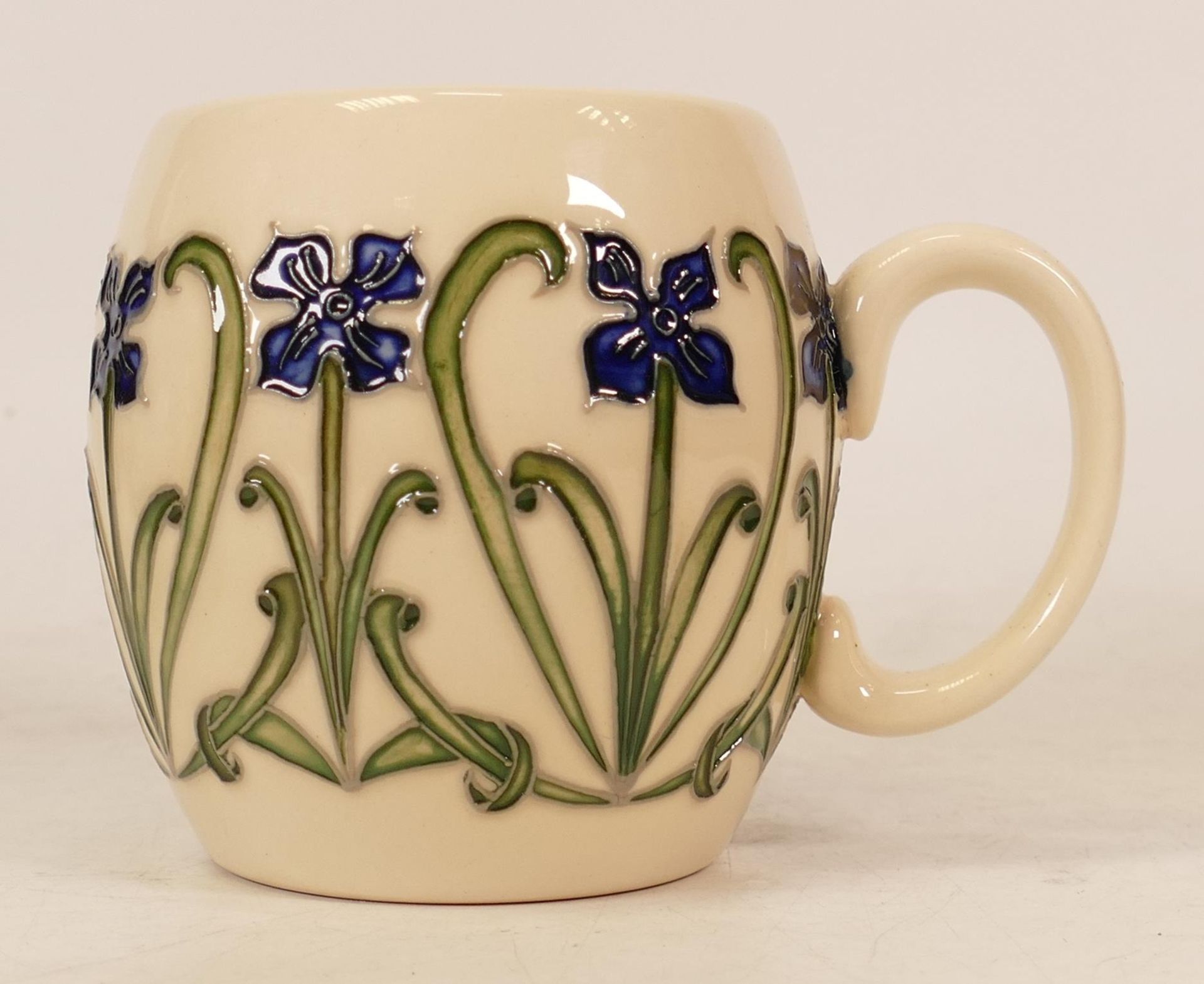 Moorcroft trial mug decorated with blue flowers dated 2/2/15