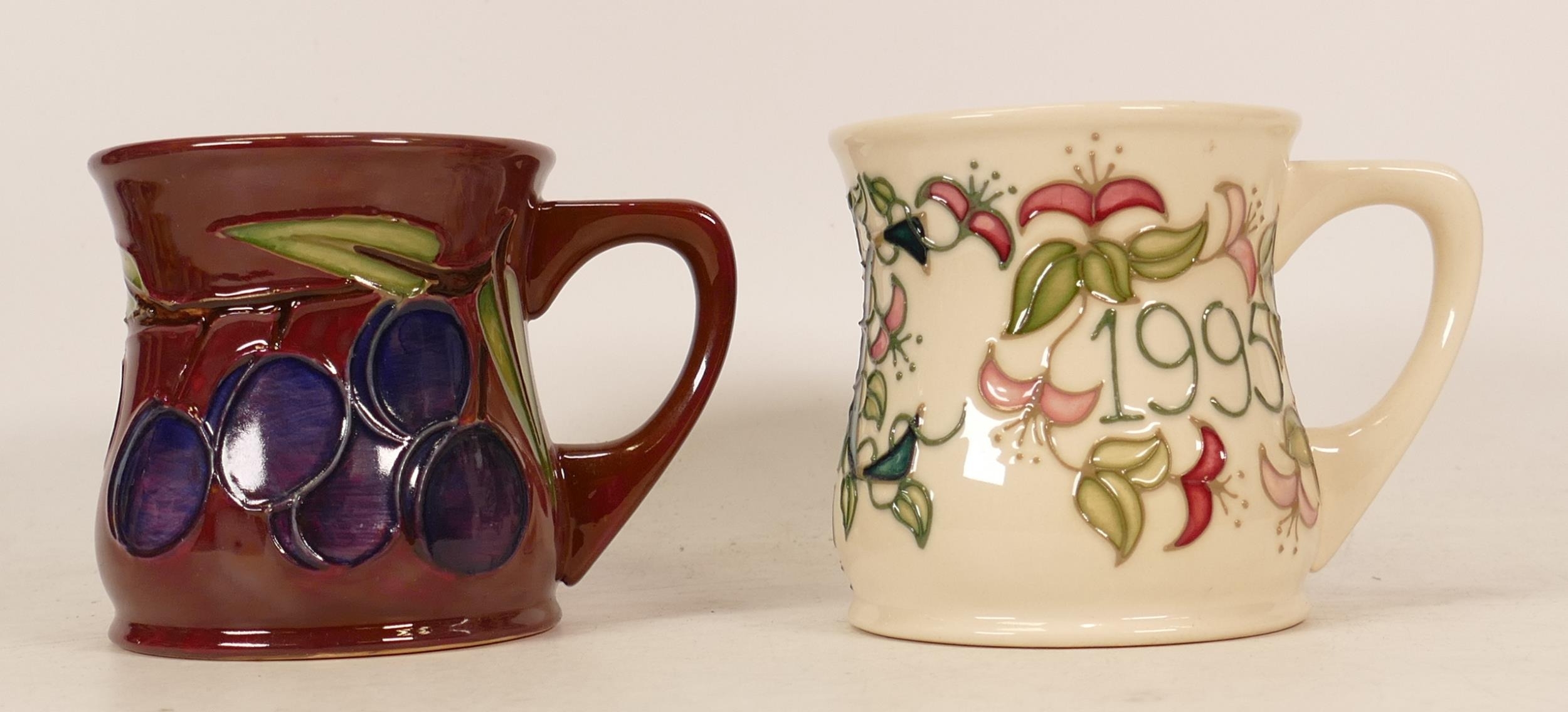 Moorcroft damson mug and mug of the year 1995 (2)