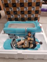 A Boxed E.P.E Official Elvis Presley Cookie Jar. Modelled as Elvis in his Iconic Blue Cadillac.