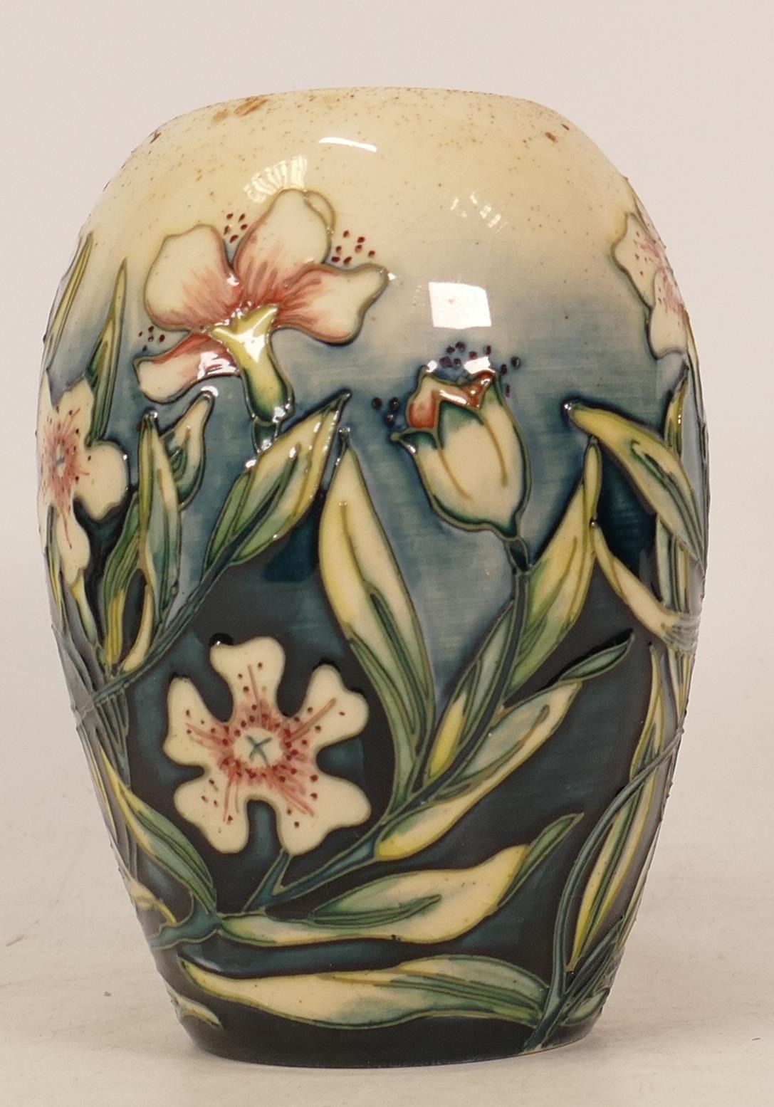 Moorcroft floral decorated trial vase, dated 23/8/2000, height 13cm