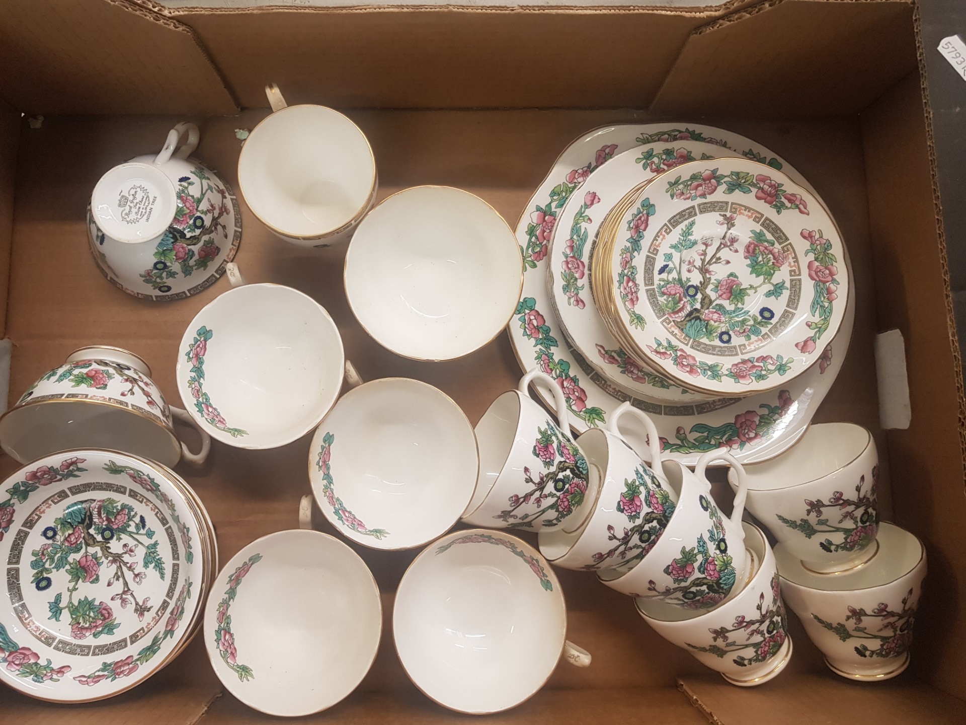A collection of Indian Tree patterned teaware by Royal Grafton and Sheltonian, including cups,