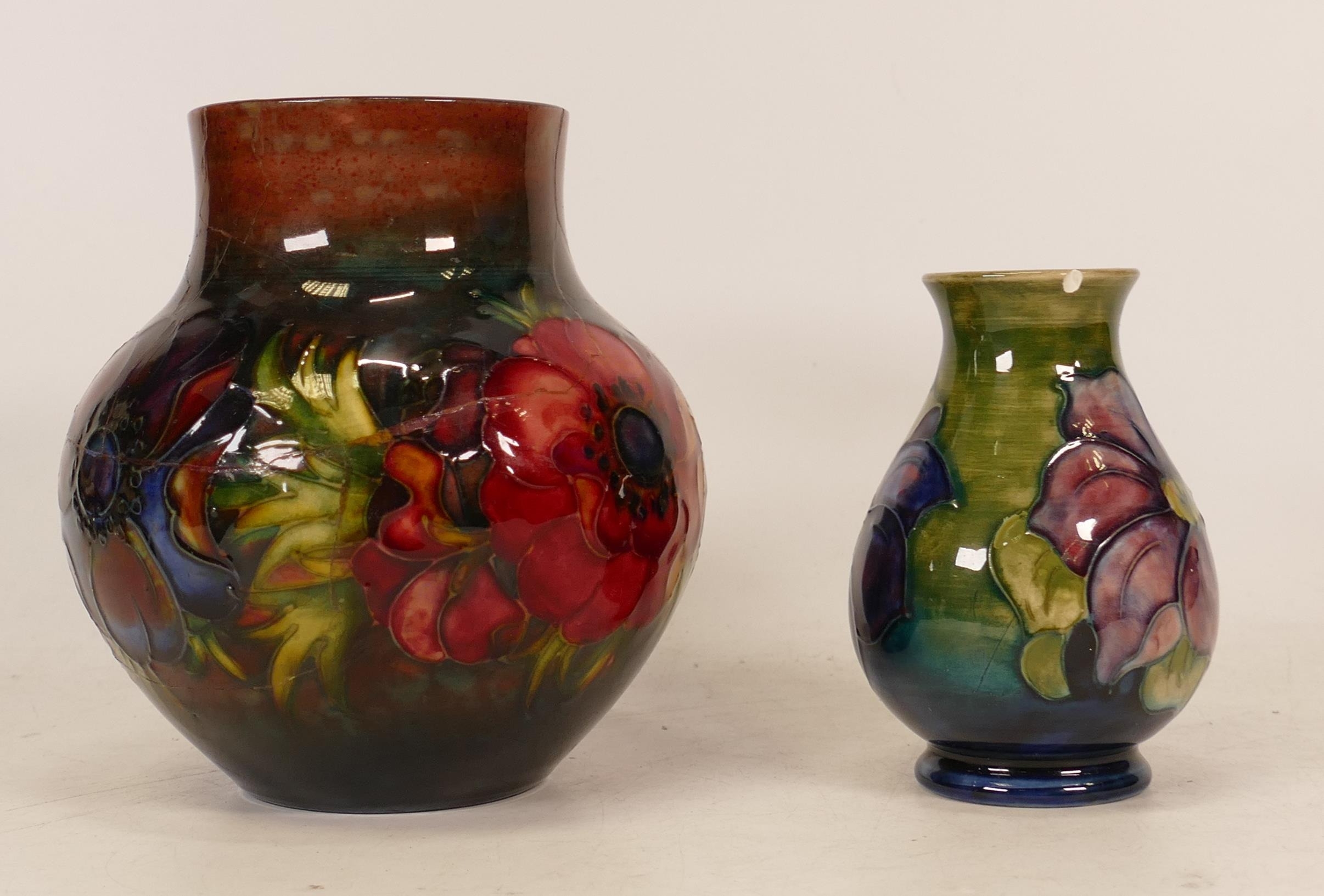 Moorcroft flambe Anemone patterned vase together with Anemone patterned vase on green ground, height