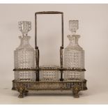 A Silverplate Crystal Glass Tantalus Set, Two Decanters and Bowl