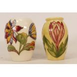 Moorcroft vase decorated in the Crocus together with Clematis decorated vase (Queen Mary sticker