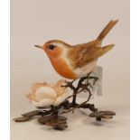 An Albany Fine China Co. Ceramic bird study incorporating metal. Modelled as a Robin with a