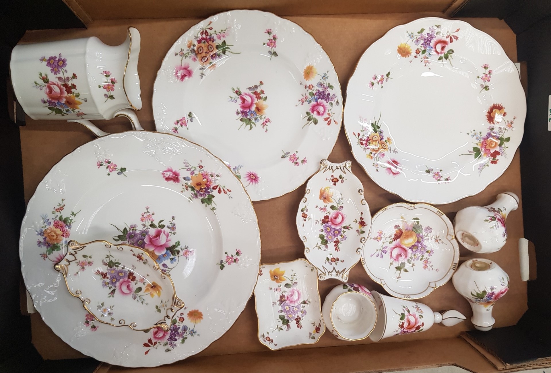 Royal Crown Derby 'Derby Posies' pattern items to include a jug, plates, salt and pepper pots, bell,