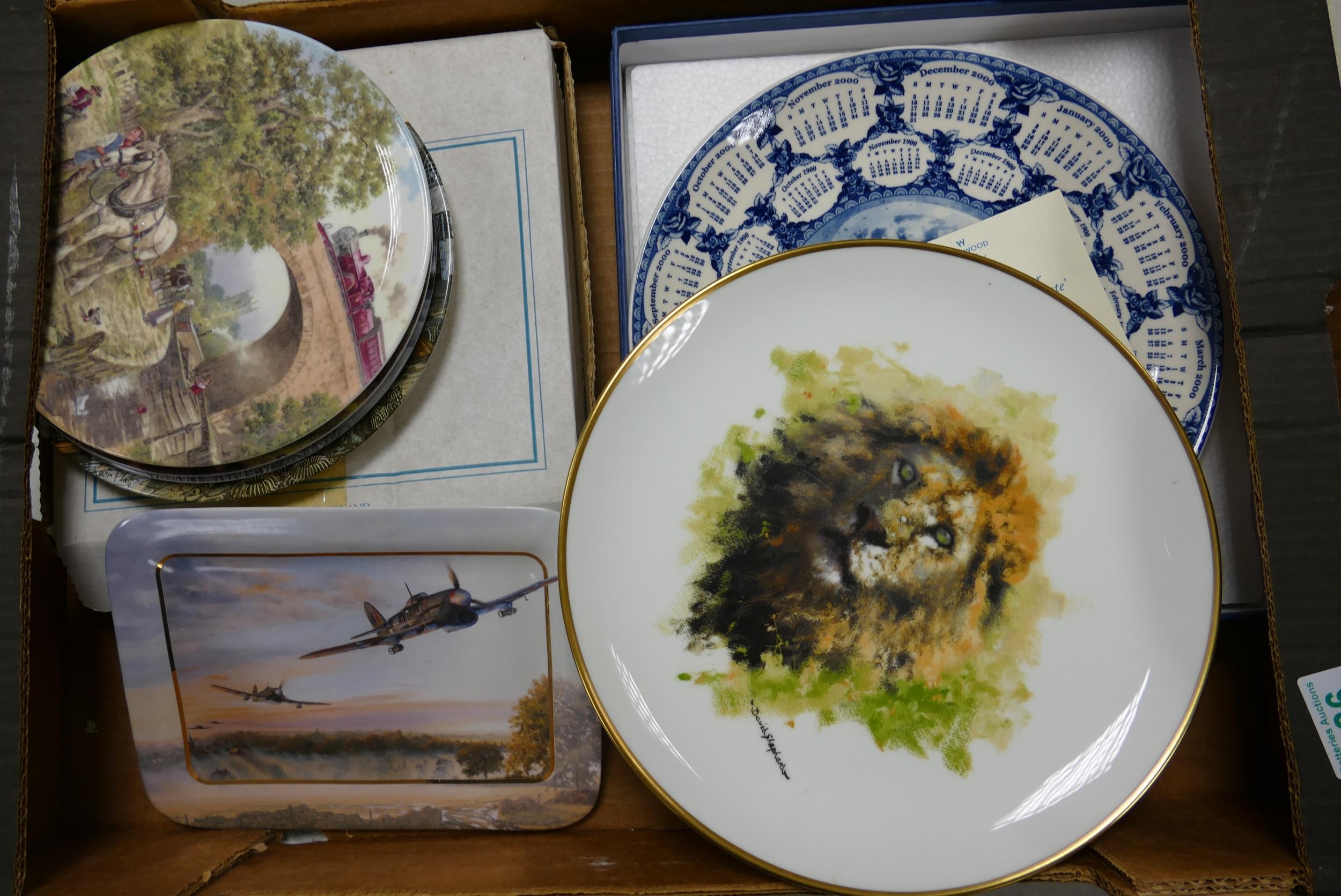 A collection of decorative wall plates to include Davenport Pottery Towards Rodeo Country,