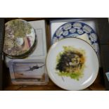 A collection of decorative wall plates to include Davenport Pottery Towards Rodeo Country,