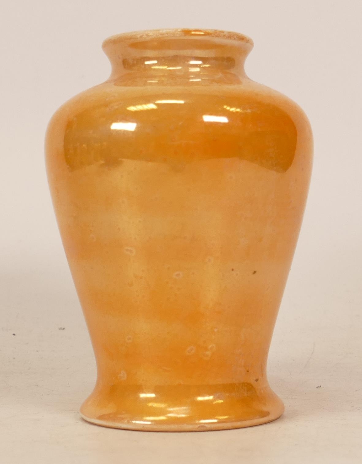 Moorcroft orange lustre vase, chip to base rim, height 9cm