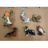 A collection of animal figures to include Beswick Robin 980, Beswick Collie dog, Border Fine Arts