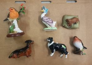 A collection of animal figures to include Beswick Robin 980, Beswick Collie dog, Border Fine Arts