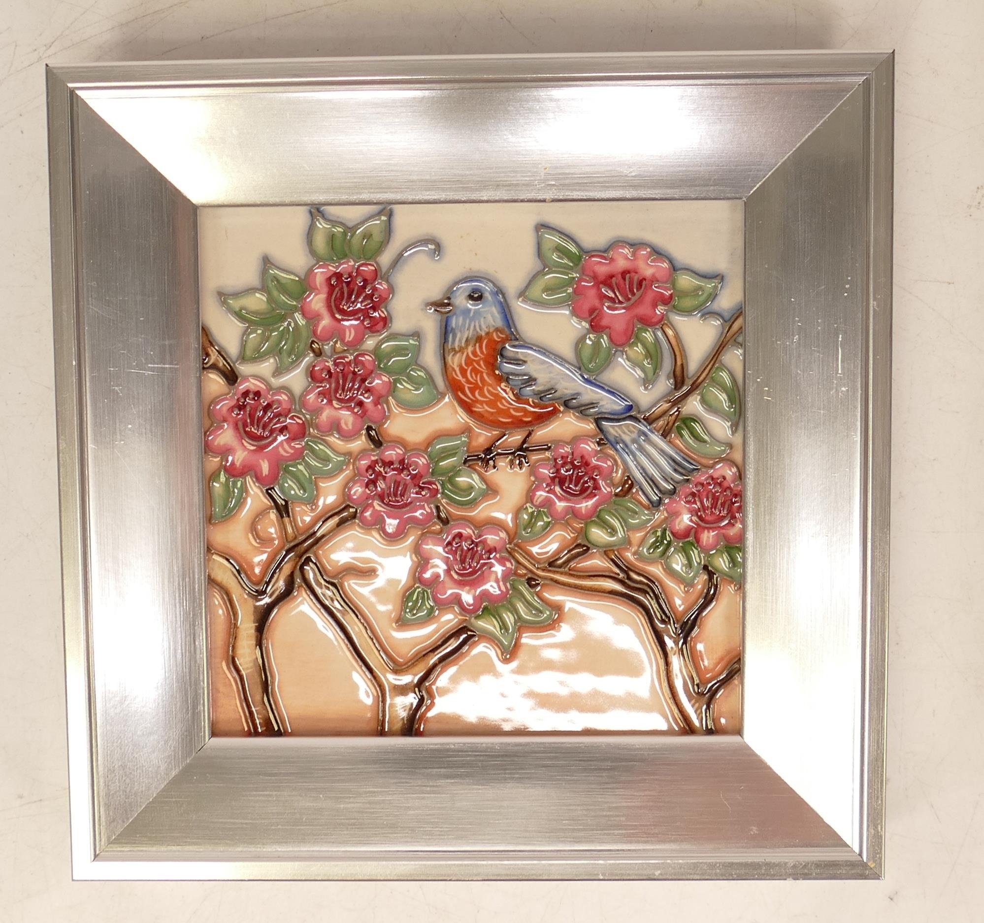 Moorcroft wall plaque decorated with an Eastern Bluebird. 14.5 squared