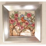 Moorcroft wall plaque decorated with an Eastern Bluebird. 14.5 squared