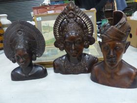 Three Carved Busts of Female Tribal Women of the Philippines or Bali. Height of tallest: 33cm (3)
