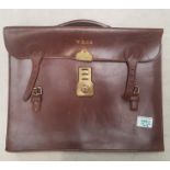 Vintage brown leather briefcase, initialled WMGB.