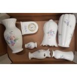 A collection of Aynsley 'Little Sweethearts' pattern items to include a mantle clock, vases, wall