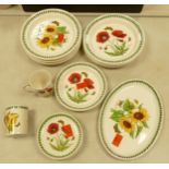A collection of Portmeirion dinner ware in the poppy and sun flower pattern to include dinner plates